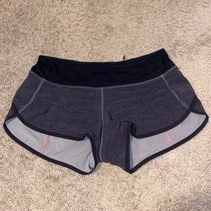 Lululemon speed up shorts with pink detailing
